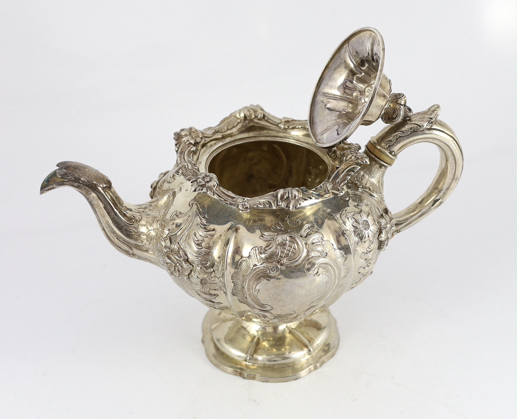 An early Victorian three piece Scottish silver inverted pear shaped tea set by Leonard Urquhart